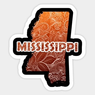 Colorful mandala art map of Mississippi with text in brown and orange Sticker